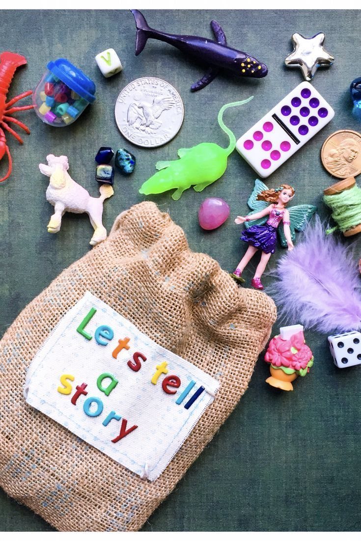 Burlap story sack surrounded by toy animals, a fairy, and game pieces.