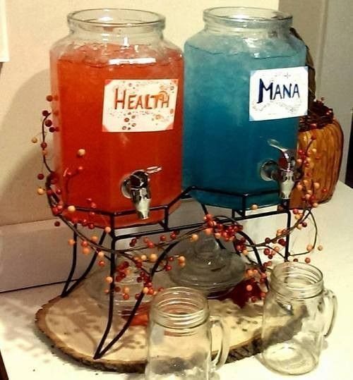Two beverage dispensers with red and blue drinks labeled Health and Mana.