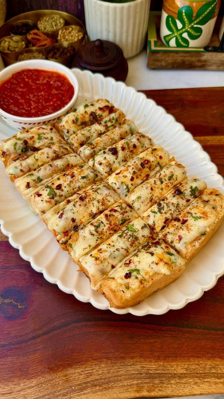 Cheese bread with herbs and red pepper flakes served with marinara sauce.